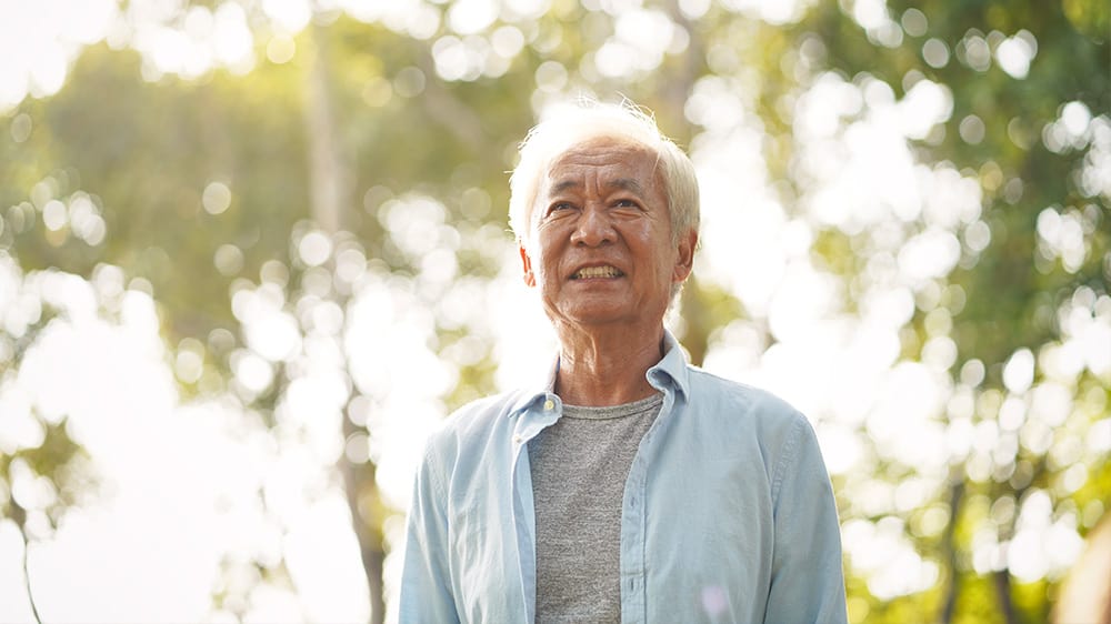 smiling asian senior man