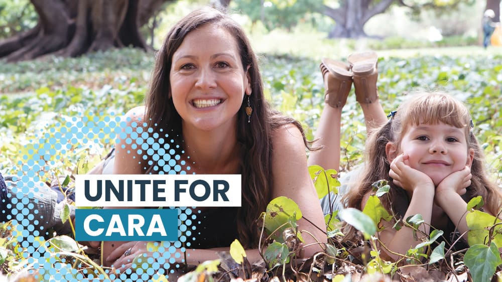 unite for cara. Cara on the grass with her daughter