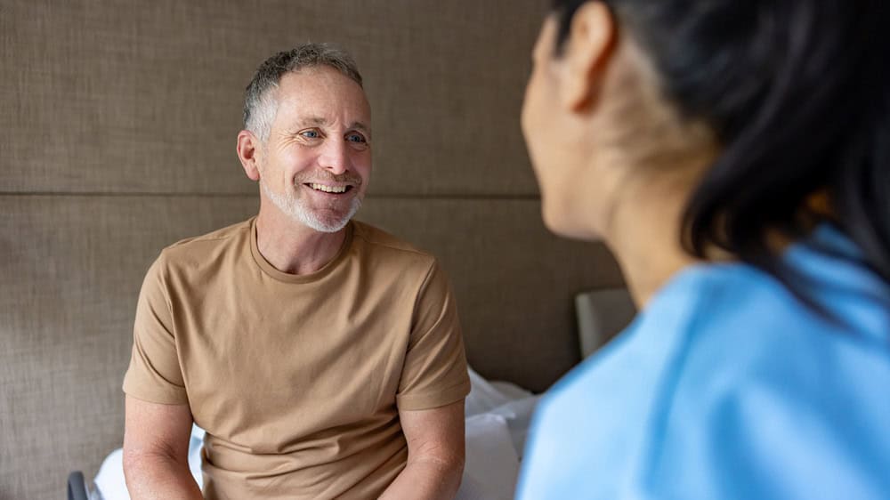 A man talking with a health professional 