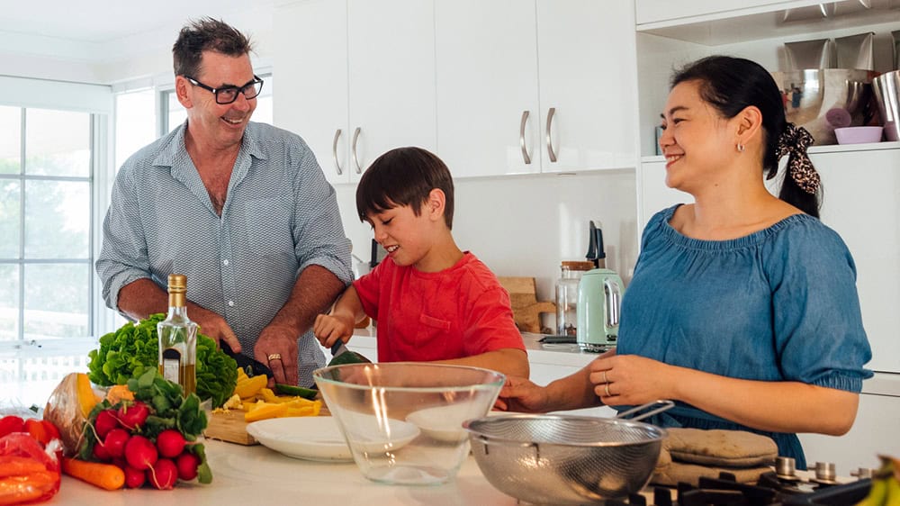 Family preparing a meal in the kitchen