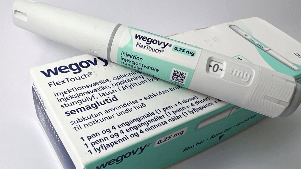 Single injection of Wegovy on top of a Wegovy box.