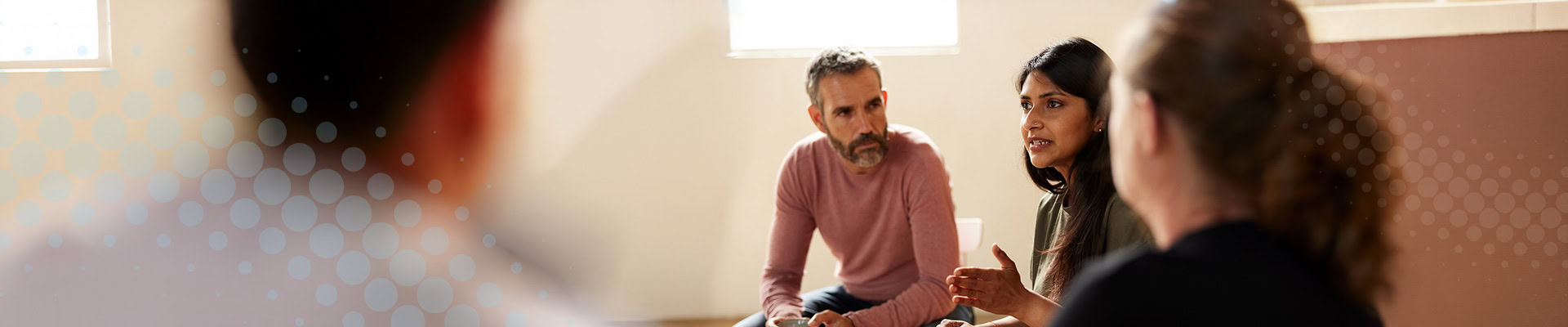 Members of the community coming together at a meeting