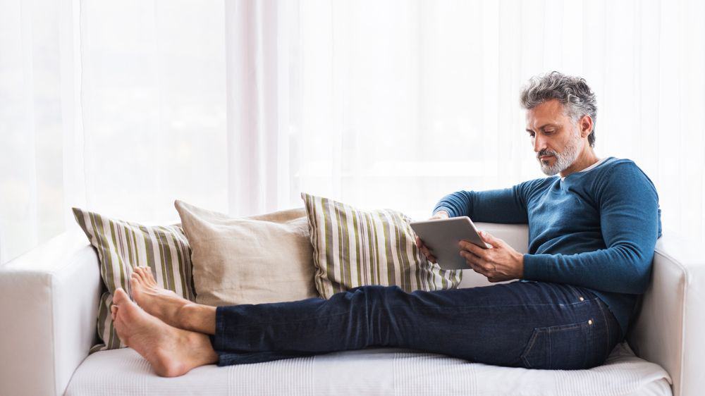 resting man on sofa