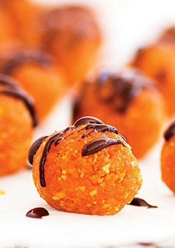Apricot and chocolate balls on a tray