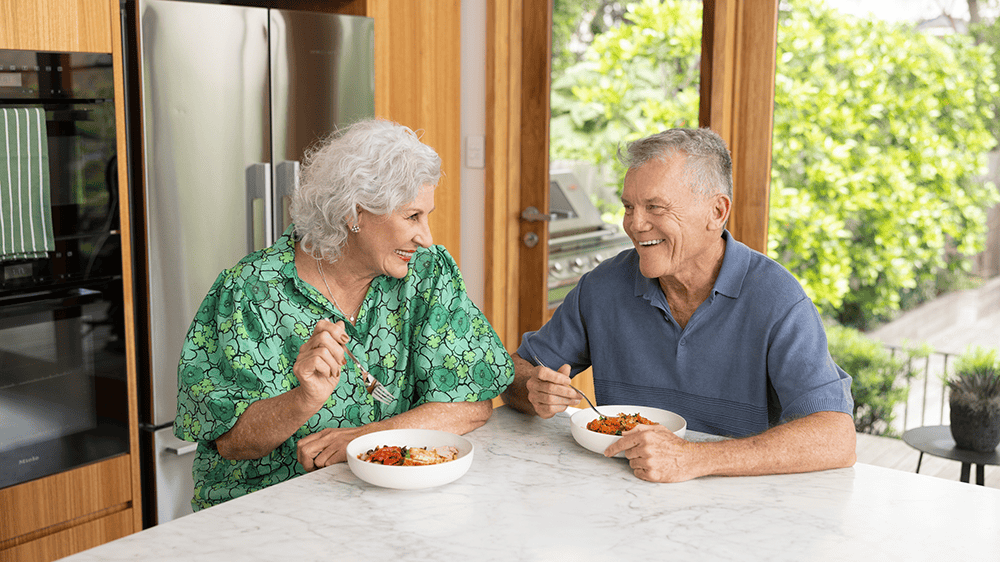 Couple enjoying Youfoodz meals 