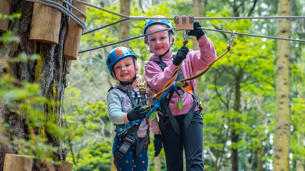 Kids smiling at DiaBuddies Treetops Adventure event 