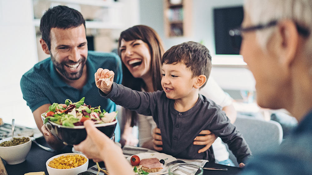 Family having salad lunch together