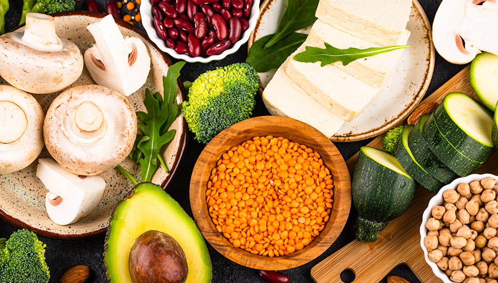 selection of high fibre vegetarian food including red lentils, avocado, mushrooms and tofu