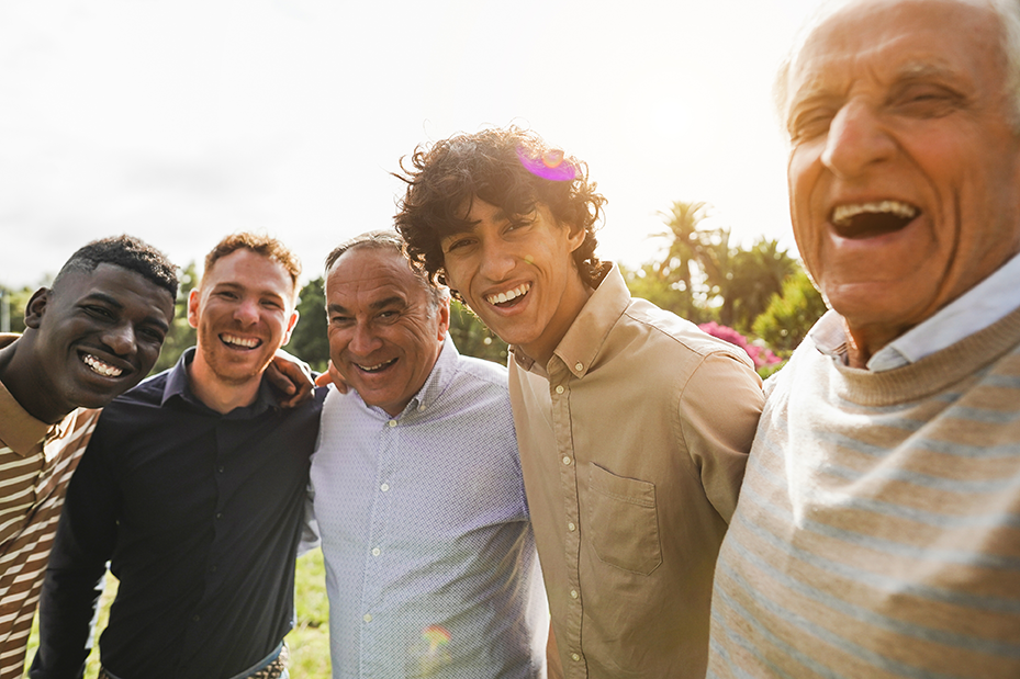 Group of intergenerational men taking a selfie