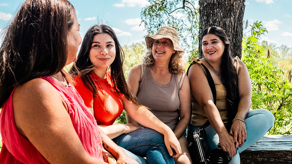 Group of women chatting in a park