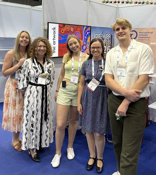 Group of people standing at convention, IDF young leader ambassadors