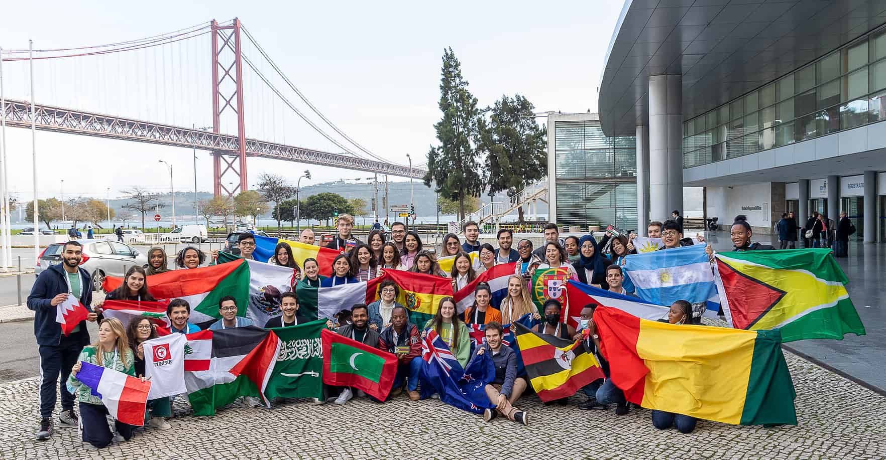 Young leader Jenna with group and flags