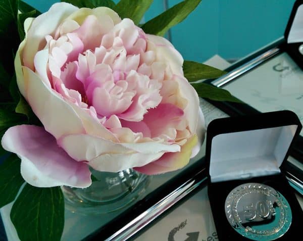 Kellion 50 medal and peony rose