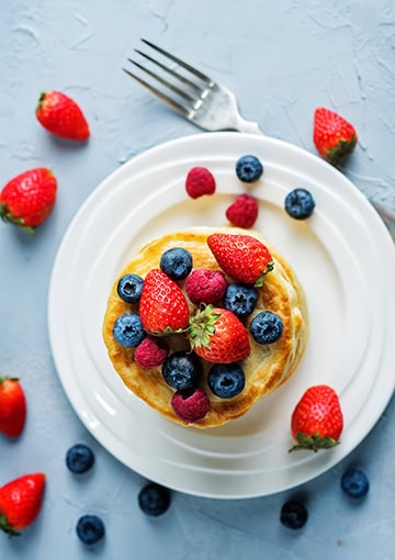 Pancakes with fruit on a plate