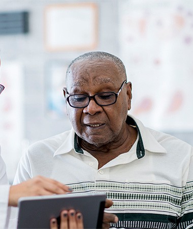 Man talking to a health professional