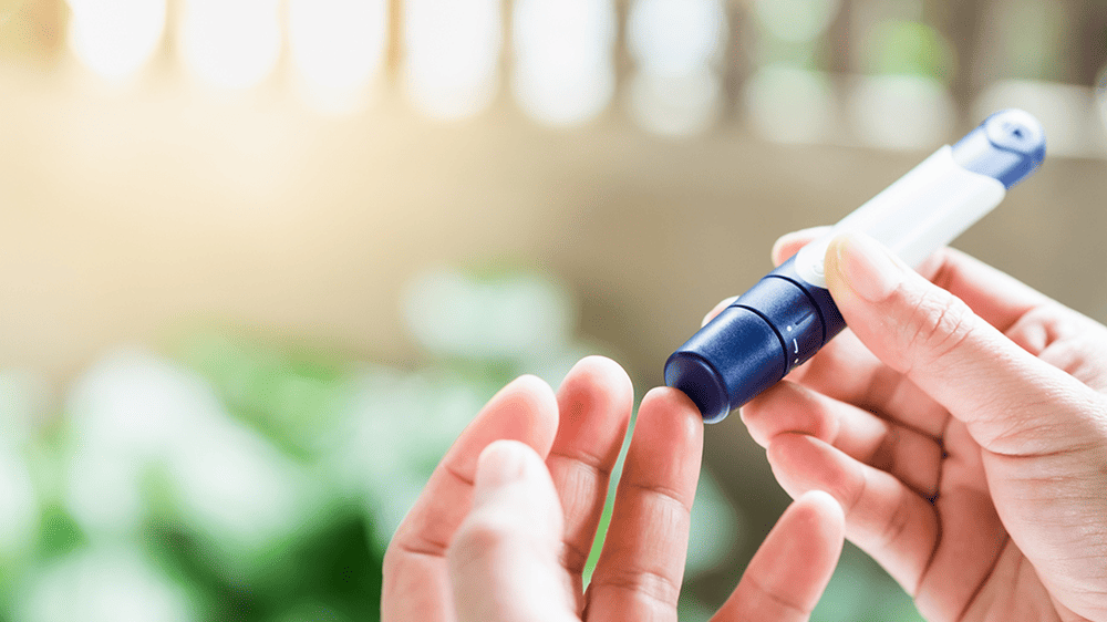 Monitoring your blood glucose level finger prick