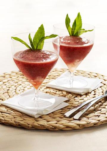 Frappe with berries and pineapple garnished with mint