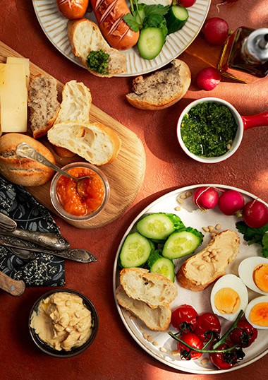 Ploughman's lunch spread out on table