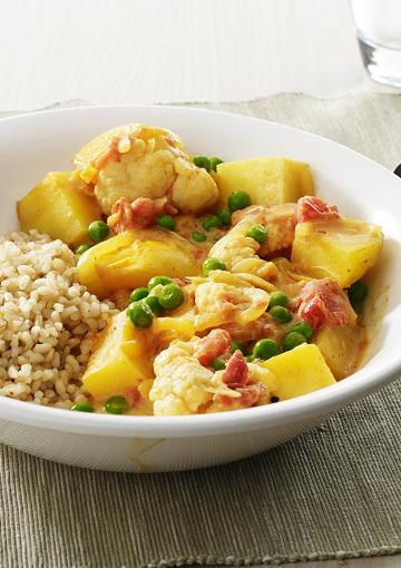 Curry with potato and vegetables with brown rice