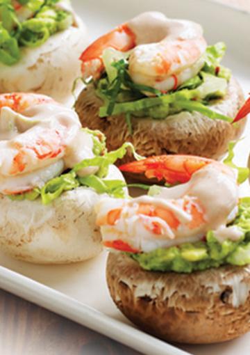 prawn canapes on mushrooms with green onions