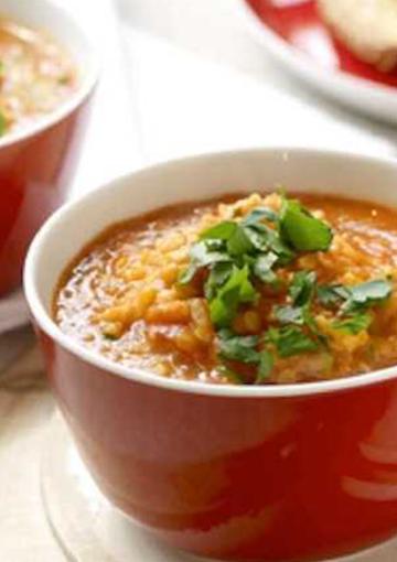 Red Lentil and Tomato Soup topped with coriander