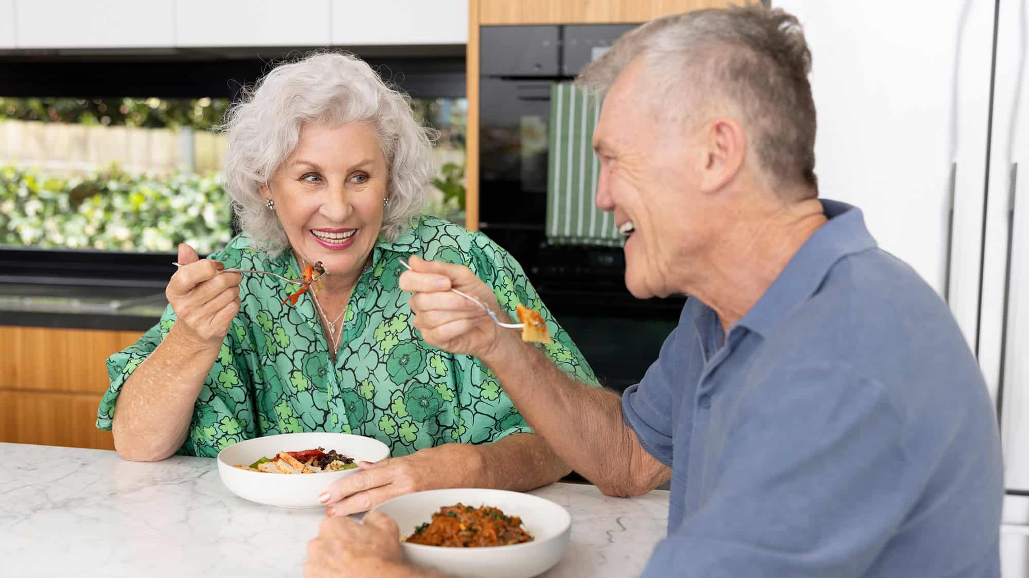 Couple sharing a Youfoodz meal together 