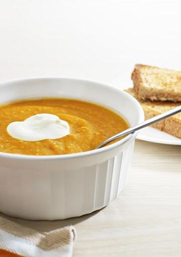 Pumpkin Soup topped with yoghurt with toast