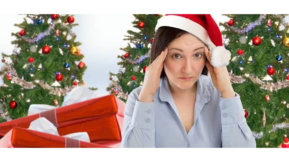 stress less, woman stressed in a Santa hat