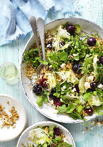 Fetta Salad with barley and cherries topped with chopped walnuts