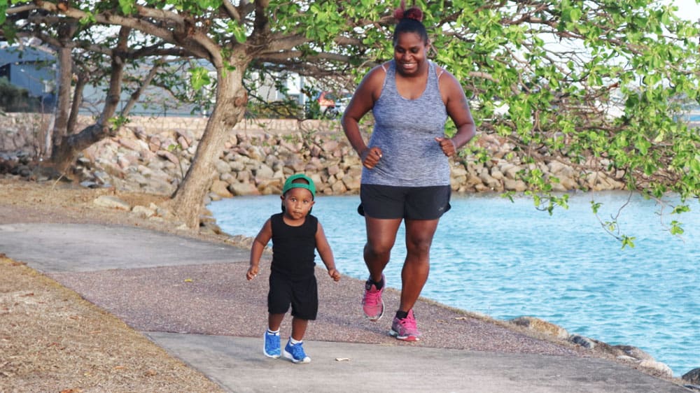 Woman and child walking outdoors