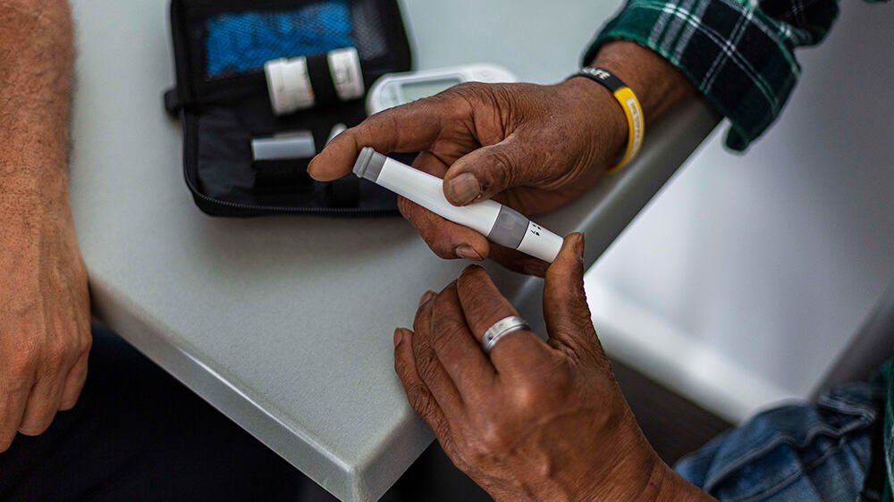 Person monitoring their blood glucose levels 