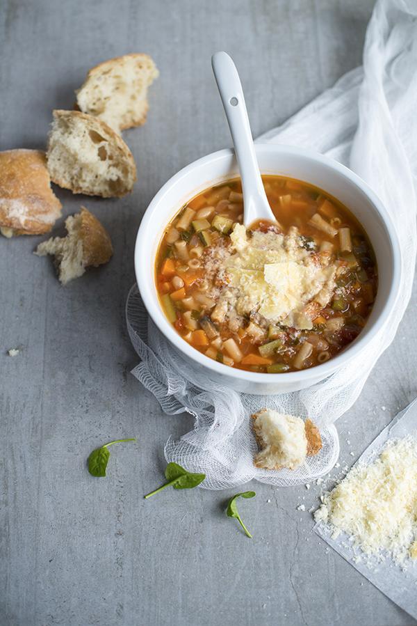 Minestrone soup topped with parmesan