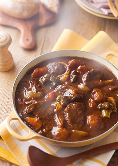 Beef shank pieces simmered until tender in a rich, creamy broth