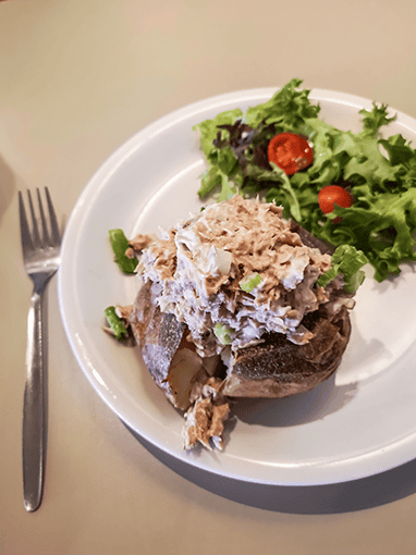 baked potato with tuna and salad