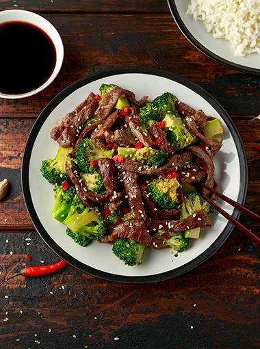 Beef and vegetable stir fry on a plate, ready to eat