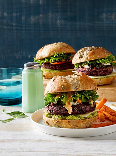 Beetroot Burger with lettuce and sweet potato fries