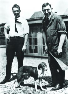 Surgeon Frederick Banting and research assistant Charles Best and their dog