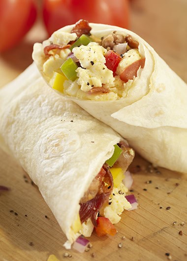 Breakfast Burrito with Scrambled Eggs, Bacon, Sausage, Tomatoes and Peppers