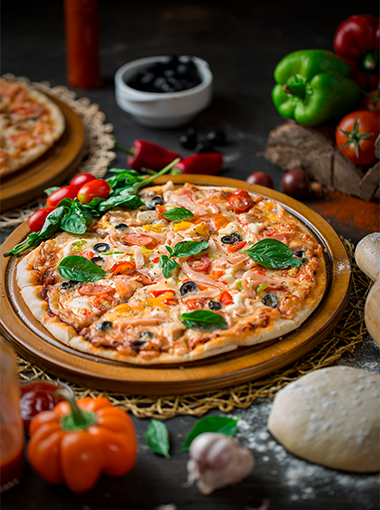 Pizza on a wooden cutting board