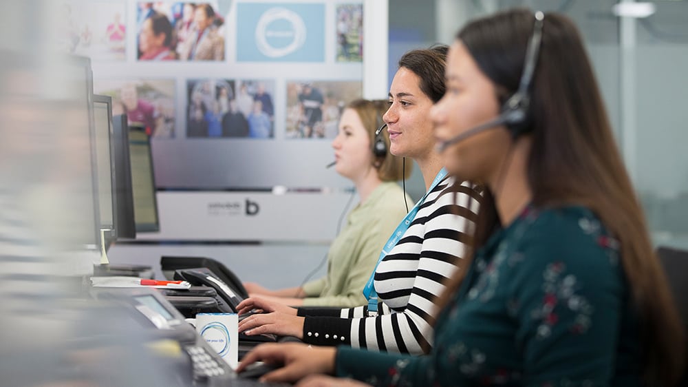 women working at a call centre helpline