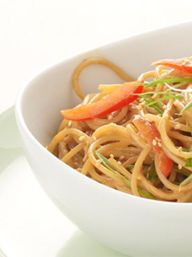 Cold Noodles with sesame sauce topped with spring onion and sesame seeds