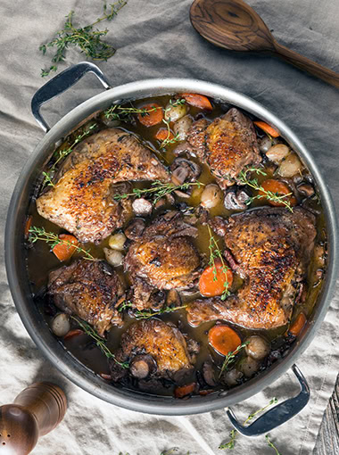 Homemade French Coq Au Vin Chicken with Veggies and Sauce