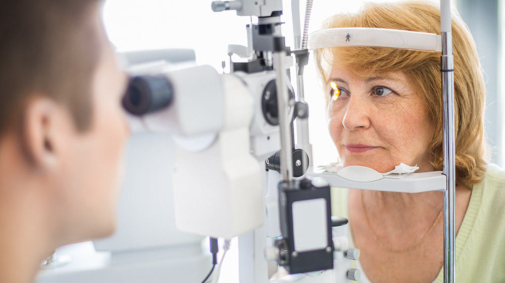 Woman having her eyes examined