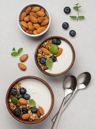 Greek yoghurt with nuts and berries in a bowl