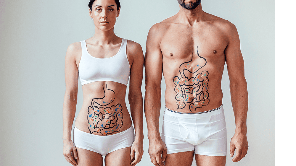 How diabetes affect the gut image of two people with diagram drawn on their stomachs