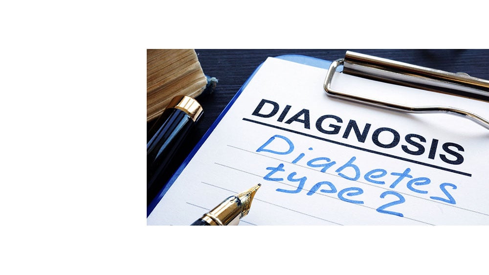 type 2 diabetes diagnosis written on a pad of lined paper