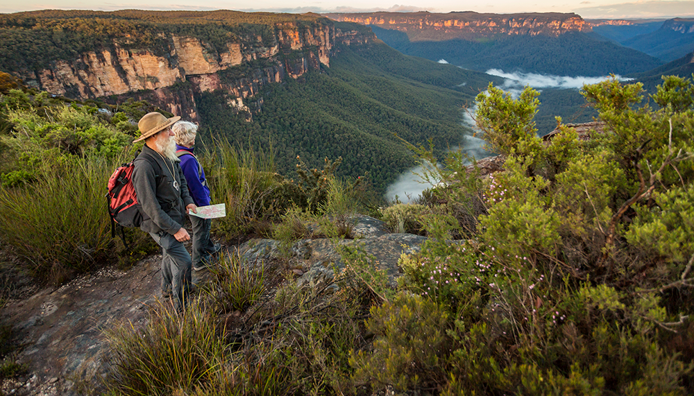 older couple looking out across the Blue Mountains