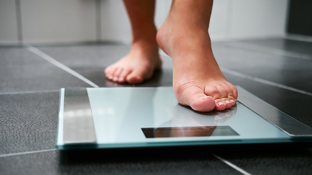 weight management, stepping on scales
