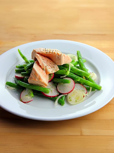 Poached salmon with green beans and radish salad