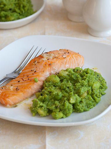 Salmon and mashed peas on a plate, ready to eat